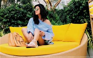 Indian TV actress & model, Kishwar Merchant Rai in a casual attire on a poolside